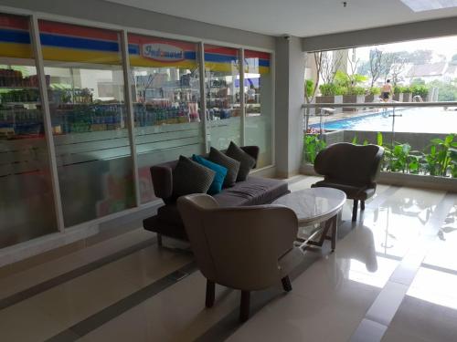 Πισίνα στο ή κοντά στο Will's Apartment - Parahyangan Residence