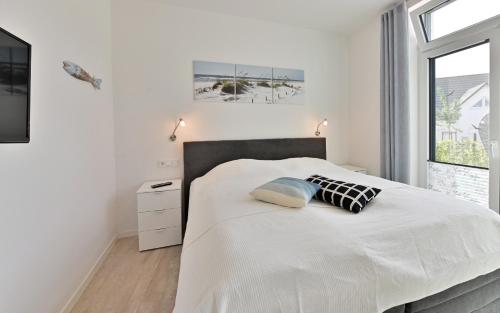 Postel nebo postele na pokoji v ubytování Ferienwohnung Sonnengarten