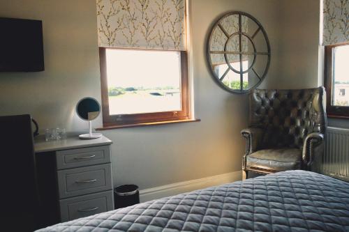 A bed or beds in a room at Shard Riverside 