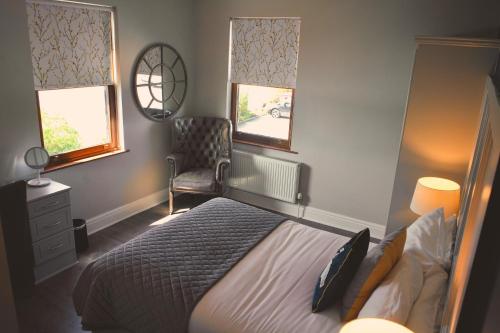 A bed or beds in a room at Shard Riverside 