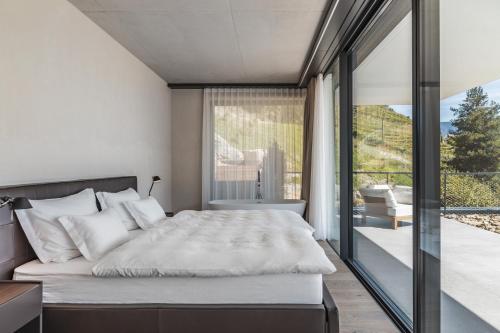 Posteľ alebo postele v izbe v ubytovaní Arua Private Spa Villas