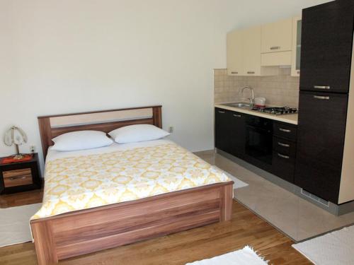 Kuchyň nebo kuchyňský kout v ubytování Apartments & Room Masa