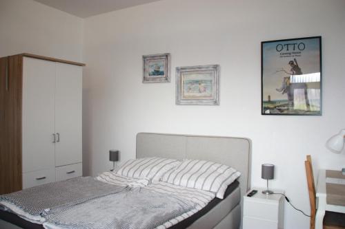 Postel nebo postele na pokoji v ubytování Ferienwohnung Möwennest I