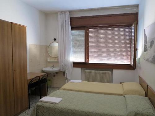 Cama o camas de una habitación en Hotel Vidale