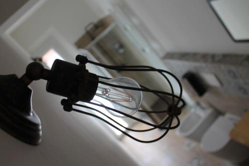 a hair dryer sitting on top of a table at Dimora Orfeo in Bologna