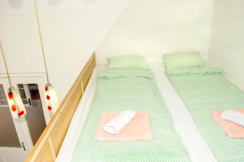 Cama o camas de una habitación en Liberty Square Apartments
