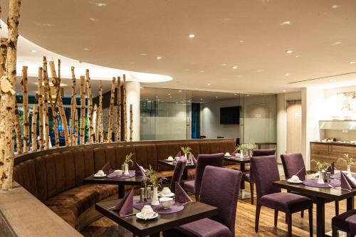 Posezení v ubytování Business Class Hotel Ebersberg