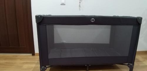 a flat screen tv sitting on a stand in a room at Huncovská 14 in Košice