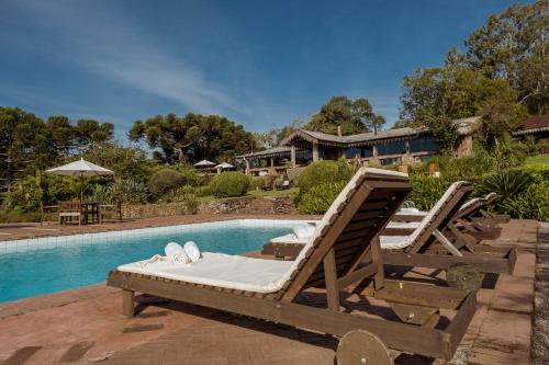 Piscina en o cerca de Estalagem e Restaurante La Hacienda