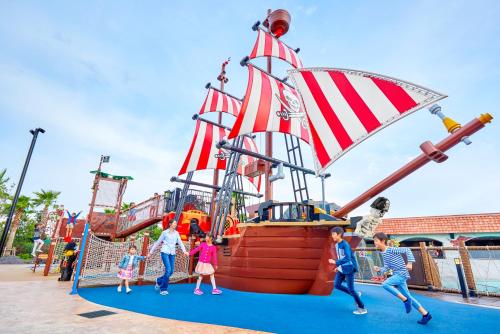 a group of children playing on a pirate ship playground at LEGOLAND Japan Hotel in Nagoya