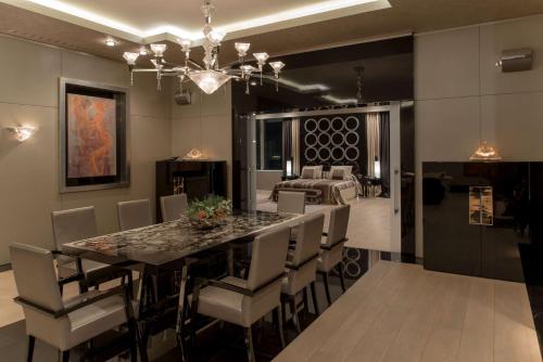 a dining room with a table and chairs at Hyatt Centric Levent Istanbul in Istanbul