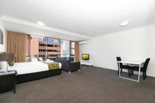 Katil atau katil-katil dalam bilik di The Astor Apartments