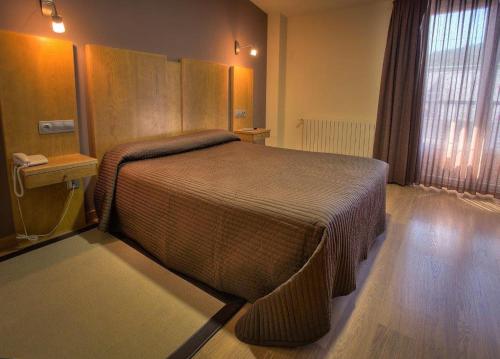 Katil atau katil-katil dalam bilik di Hotel Lusitano