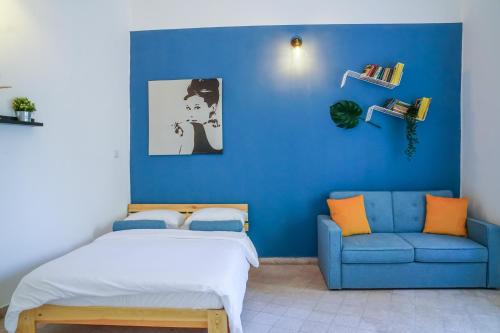 מיטה או מיטות בחדר ב-Mayer 8 Hotel By Peraia