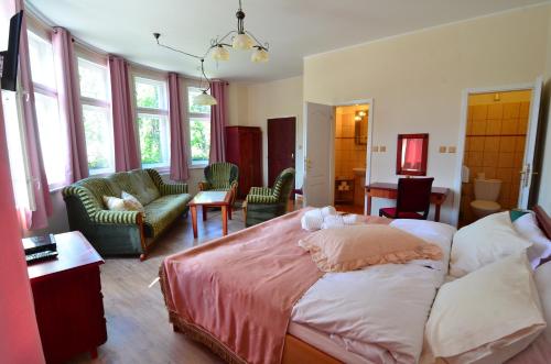 Postel nebo postele na pokoji v ubytování Baronka Bed & Breakfast & Bistrot