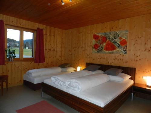 Postel nebo postele na pokoji v ubytování Gästehaus zum Bären