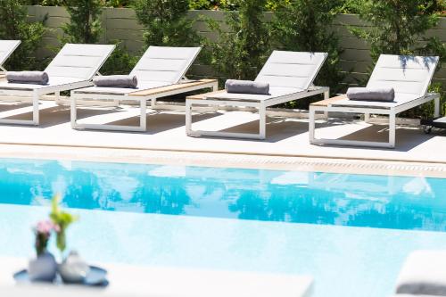 The swimming pool at or close to Vasilios Villa, with Pool, Gym & Close to Beach, By ThinkVilla