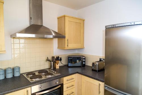 Η κουζίνα ή μικρή κουζίνα στο Ropewalks Apartments by Happy Days