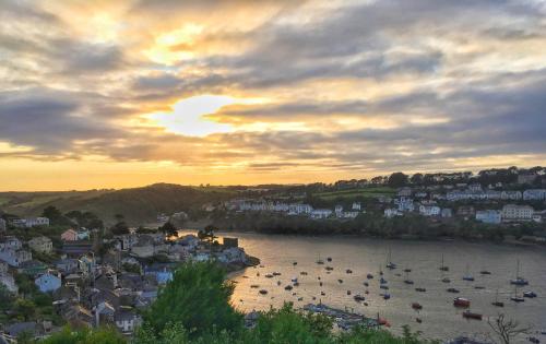 a view of a harbor with boats in the water at Havener's in Fowey