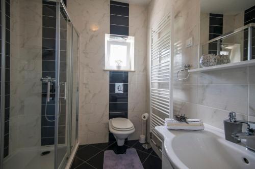 Kúpeľňa v ubytovaní Villa Natalija