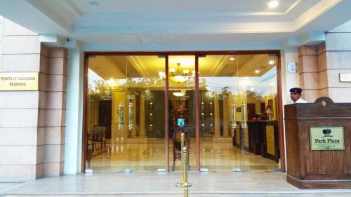 a man is standing in front of a building at Park Plaza Jodhpur in Jodhpur
