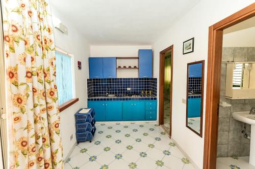 Kuchyňa alebo kuchynka v ubytovaní Appartamenti Pomelia - Lampedusa