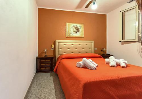 Posteľ alebo postele v izbe v ubytovaní Appartamenti Pomelia - Lampedusa