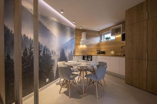 Η κουζίνα ή μικρή κουζίνα στο Apartamenty Rynek w samym centrum Ustronia - Dream Apart