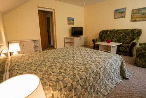 Uma cama ou camas num quarto em Egliu Slenis