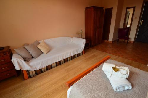 Postel nebo postele na pokoji v ubytování Baronka Bed & Breakfast & Bistrot