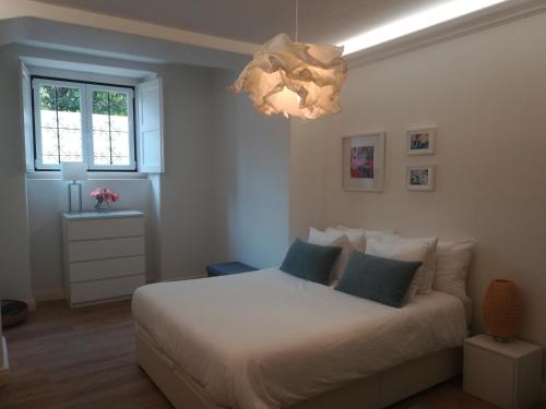 Cama o camas de una habitación en Apartment Carvalho Araujo