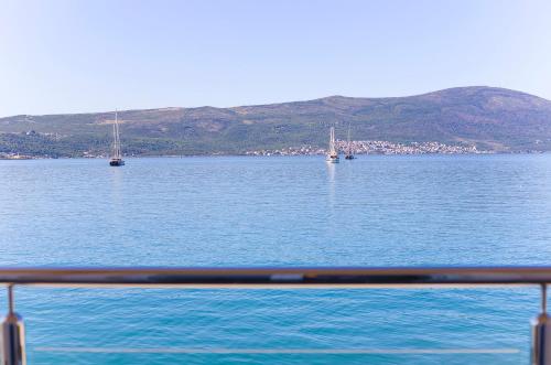 a view of a large body of water with boats at Apartments Isja in Tivat