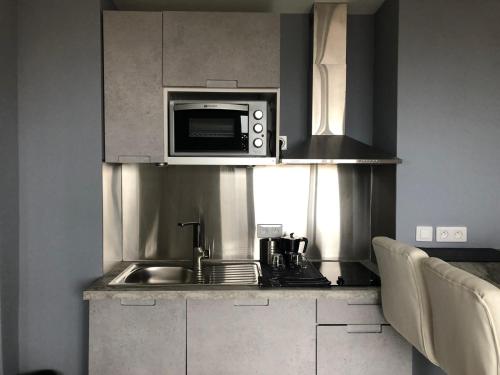 Η κουζίνα ή μικρή κουζίνα στο Stella Apartment