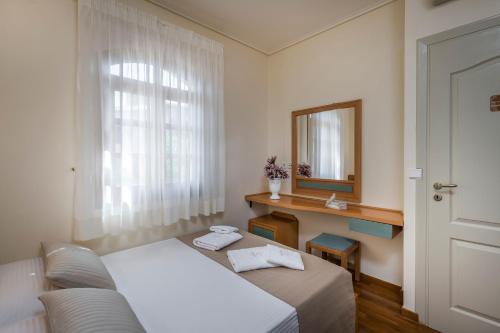 Katil atau katil-katil dalam bilik di Iason Villas – Chania, Crete