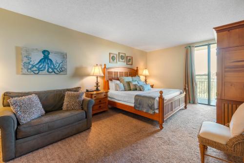 Ένα ή περισσότερα κρεβάτια σε δωμάτιο στο Villas Of Amelia Island
