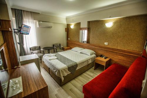 Ένα ή περισσότερα κρεβάτια σε δωμάτιο στο Hotel Cenka Ephesus