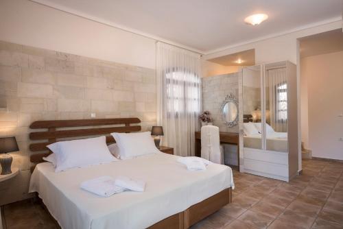 Katil atau katil-katil dalam bilik di Iason Villas – Chania, Crete