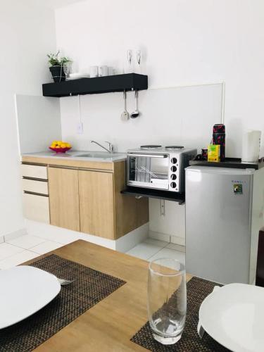 Itá Apartにあるキッチンまたは簡易キッチン