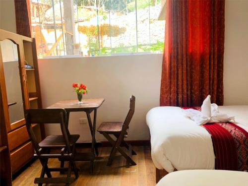 Postel nebo postele na pokoji v ubytování Inka Khawarina Tambo Lodge