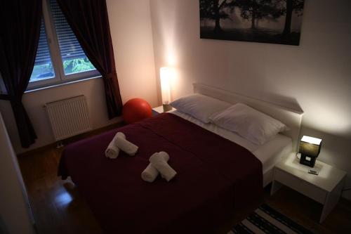 Postel nebo postele na pokoji v ubytování Oaza Apartman Arena Zagreb 2