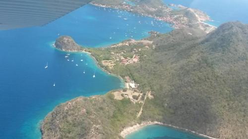 an aerial view of a island in the ocean at Les lofts Edouard in Terre-de-Haut