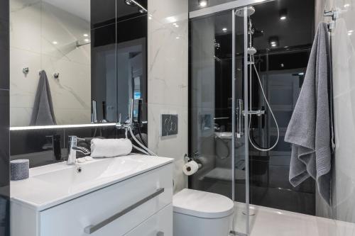 Kúpeľňa v ubytovaní P&O Apartments Zgoda