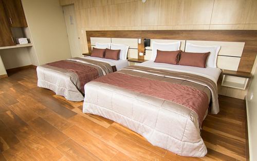 Postel nebo postele na pokoji v ubytování Martinika