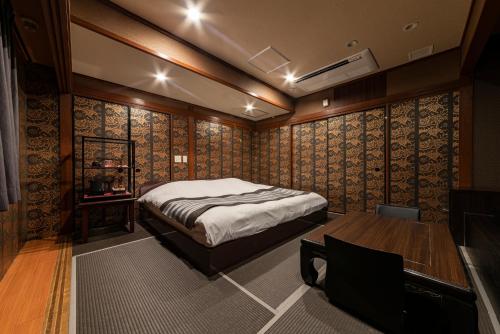 Postel nebo postele na pokoji v ubytování HOTEL Mai Sakura ADULT ONLY