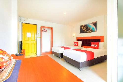 Voodi või voodid majutusasutuse Pak-D Resort toas