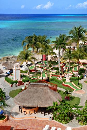 a resort with a view of the beach and the ocean at El Cozumeleño Beach Resort - All Inclusive in Cozumel