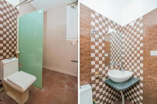a bathroom with a toilet and a sink at Hotel Airport Residency Bangalore in Devanahalli-Bangalore
