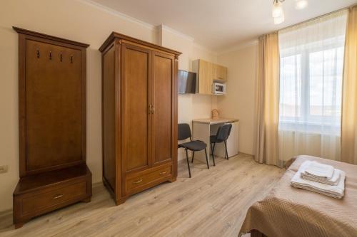 Кровать или кровати в номере Villa ZHANNA Central park