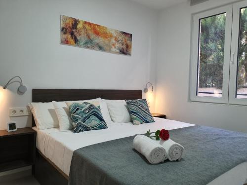 En eller flere senger på et rom på ecoSmart Apartments Granada