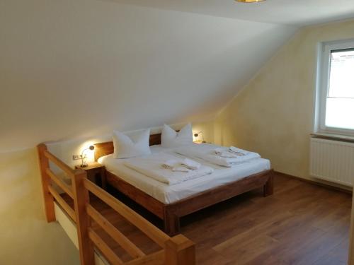 Ліжко або ліжка в номері Appartementhaus Süssling